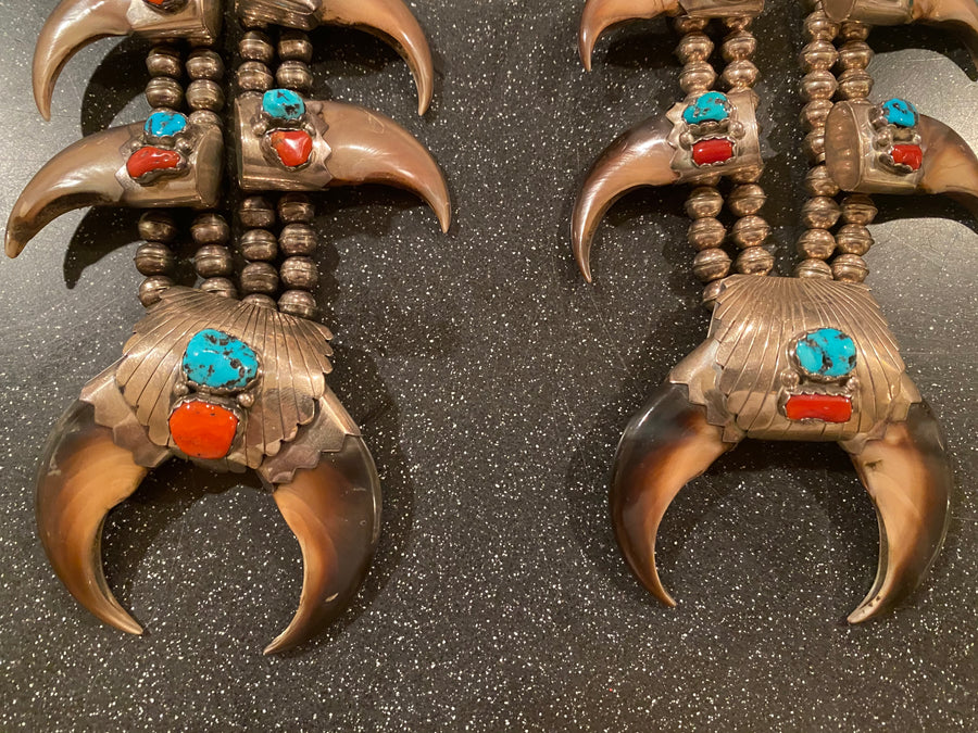 Pair of his and hers Vintage Navajo Pawn sterling Turquoise/Coral Squash blossoms with claws